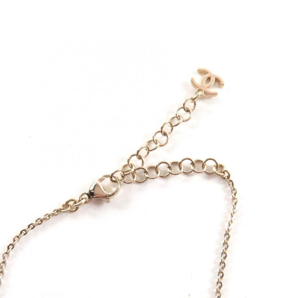 CHANEL Gold Logo Necklace - Picture 7 of 8